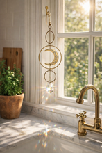 Load image into Gallery viewer, Surya Crescent Moon Brass Suncatcher
