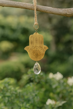 Load image into Gallery viewer, Surya Hamsa Engraved Brass Suncatcher
